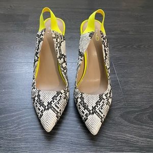 Snake print neon yellow closed toe heel.